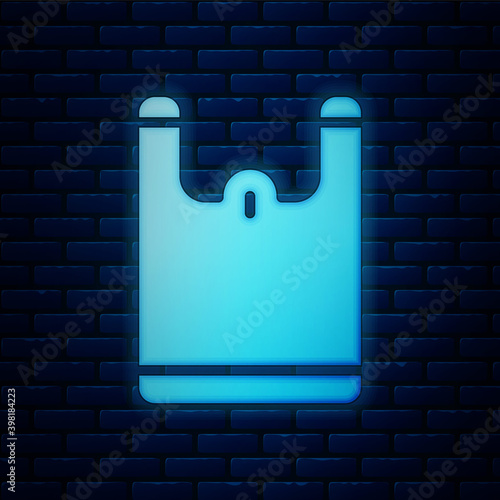 Glowing neon Plastic bag icon isolated on brick wall background. Disposable cellophane and polythene package prohibition sign. Vector.