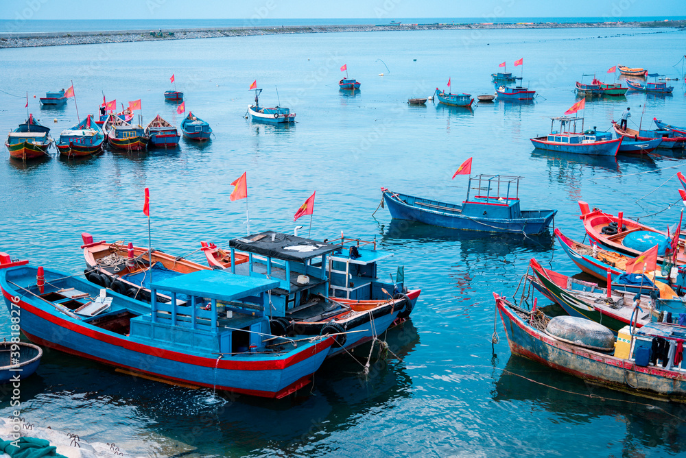many colorful boat and fisher at Ly Son Island, Quang Ngai Province, Vietnam

