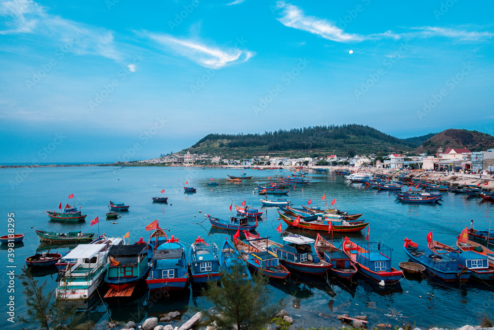 many colorful boat and fisher at Ly Son Island, Quang Ngai Province, Vietnam
