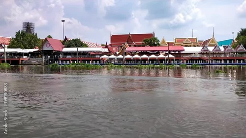 Time lapse. Floating market. Wat Rai Khing temple (Mongkhon Chindaram temple). Famous landmark of Nakhon Pathom province, Thailand. photo