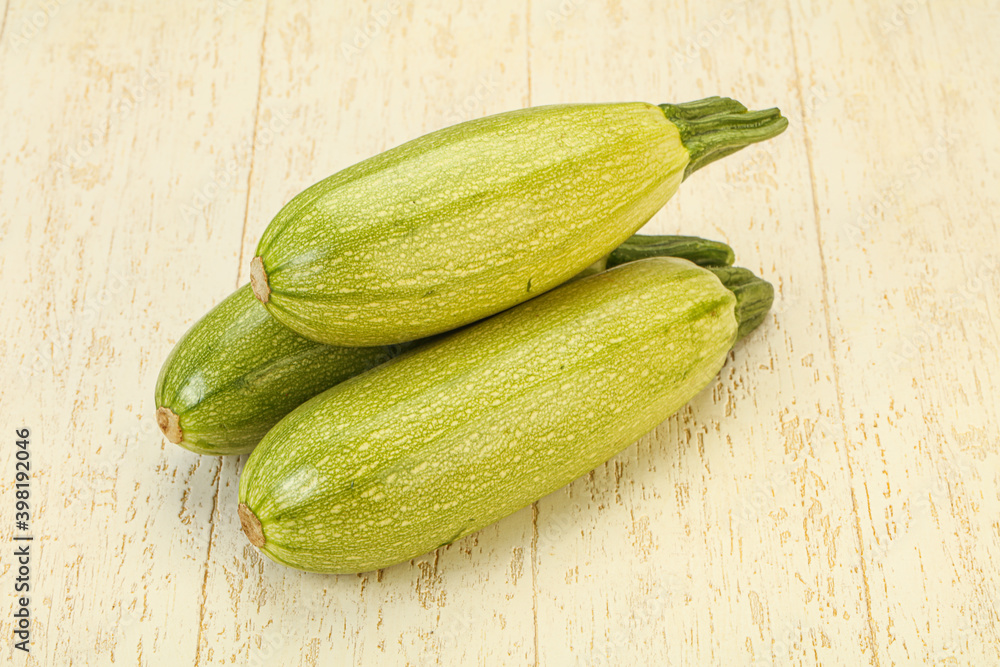 Young tasty zucchini over board Young tasty zucchini over board