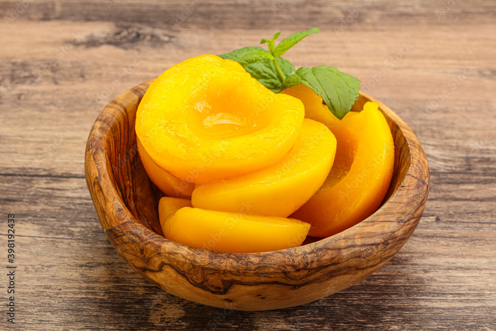Sweet ripe canned peaches with mint Sweet ripe canned peaches with mint