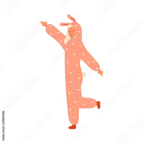 Funny young woman dancing in rabbit kigurumi at carnival party. Female animator wearing animal costume. Cheerful performer in cozy plush pajamas. Flat vector cartoon illustration isolated on white