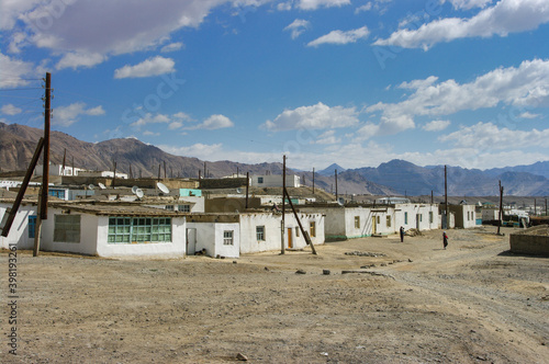 Cityscape view of high-altitude Murghab town with mountain background on the Pamir Highway in Gorno-Badakshan, Tajikistan
