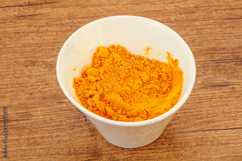 Tumeric powder in the bowl