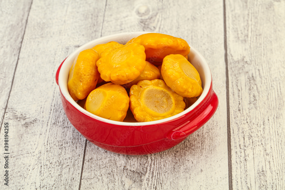 Marinated yellow patisson in the bowl Marinated yellow patisson in the bowl