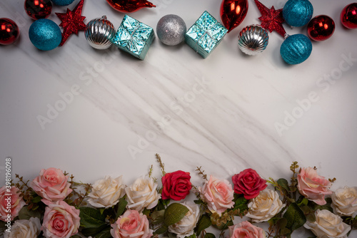 Love background on white Mable with decoration. Top view with copy space. Roses Love theme. Happy Space for text.