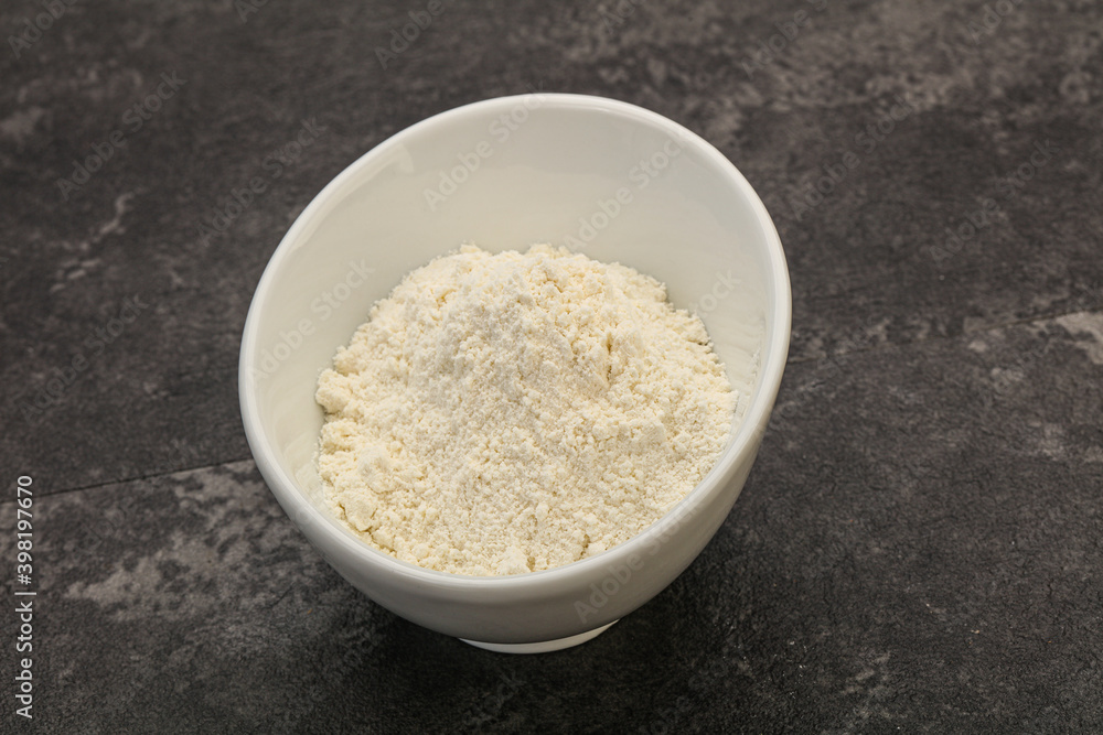 Wheat flour heap in the bowl Wheat flour heap in the bowl
