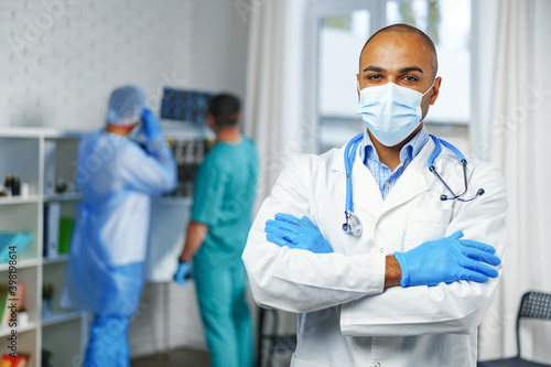 Portrait of african american doctor  hospital background