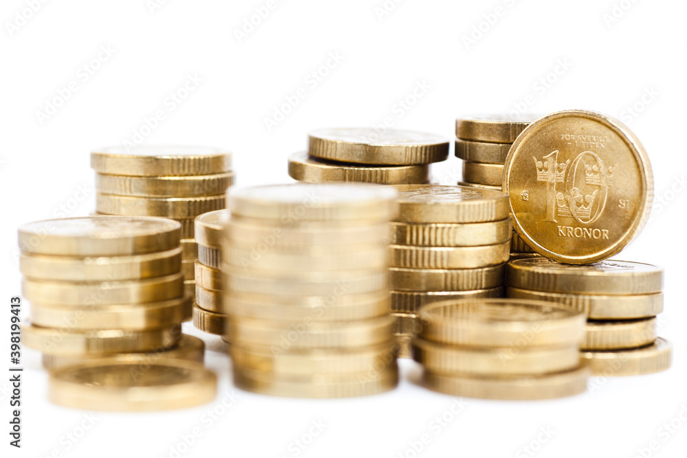 Macro photo of many Swedish 10-krona coins. Selective focus - shallow depth of field. Macro photo of many Swedish 10-krona coins. Selective focus - shallow depth of field.