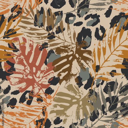 Abstract tropical floral seamless pattern: hand drawn palm, monstera leaves, animal skin print in retro vintage colors