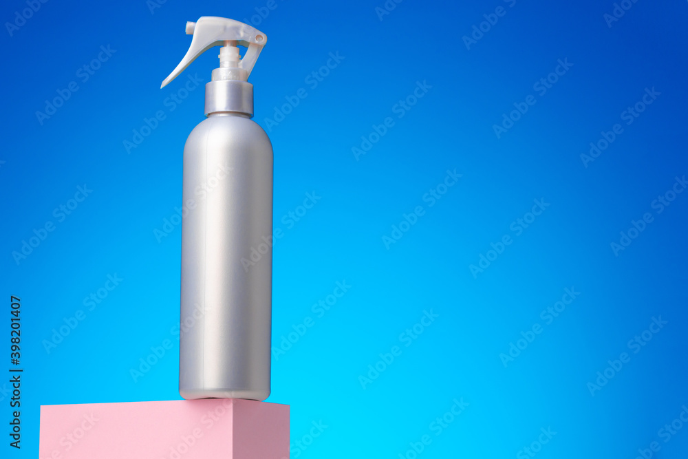 Skincare beauty products container against blue background