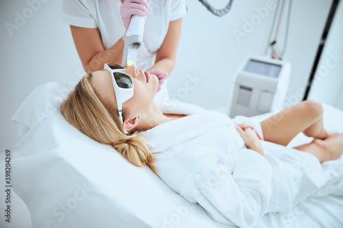 Female patient undergoing a facial rejuvenation procedure