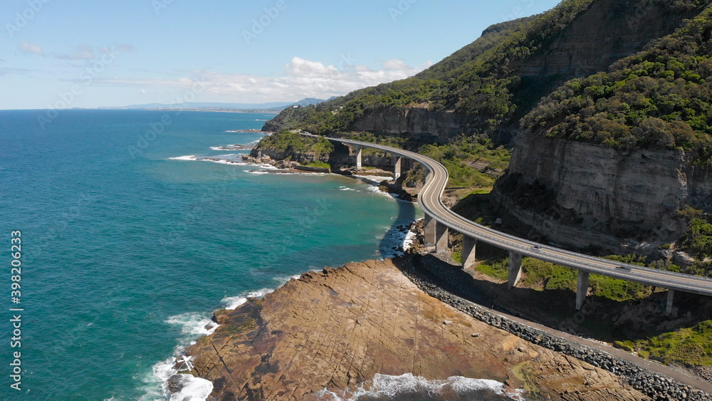 Sea Cliff Bridge in Australia. It's a beautiful road along the ocean. Beautiful scenery on a bright summer day.