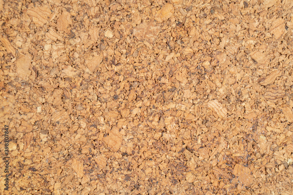 Cork wood texture. Brown cork texture. Close up. Empty blank cork board. Macro shot of corkboard texture background. Cork wood texture. Brown cork texture. Close up. Empty blank cork board. Macro shot of corkboard texture background.