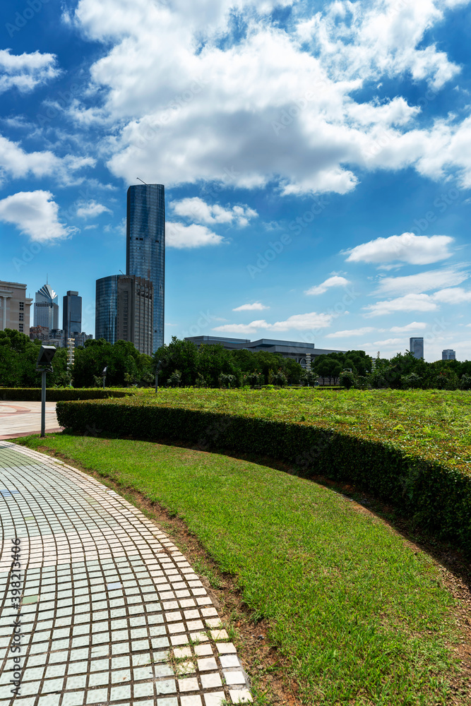 Obraz premium city park with modern building background in shanghai