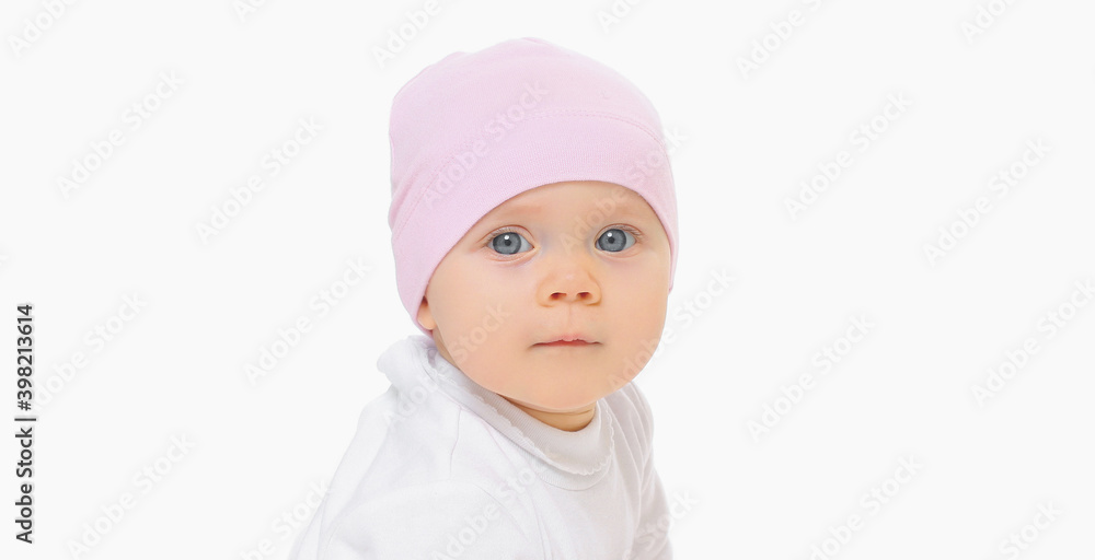 Portrait of cute little baby in pink hat over a white background Portrait of cute little baby in pink hat over a white background