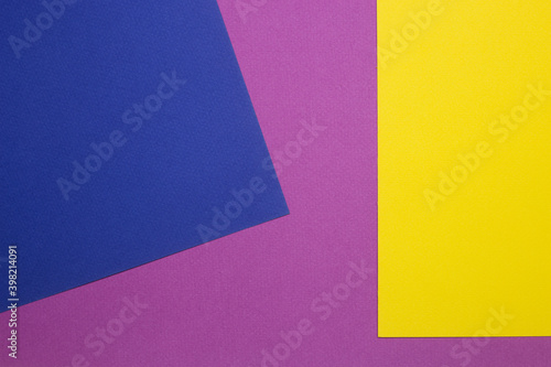 three cards of different colors geometrically placed for collage, invitation, card. yellow, blue and violet