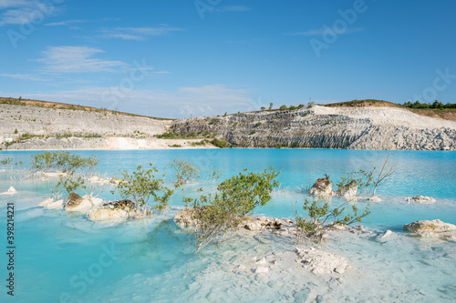 Turquoise lake at Faxe Kalkbrud limestone quarry, Denmark