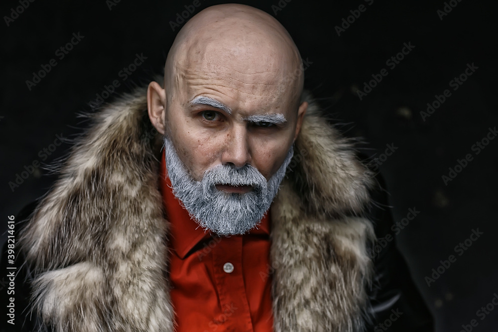 Santa Claus hipster / portrait of a fashionable modern Santa, young man with a gray beard, Christmas winter portrait Santa Claus hipster / portrait of a fashionable modern Santa, young man with a gray beard, Christmas winter portrait