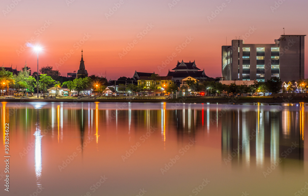 Cityscape of Udon Thani view from Nong Prachak Public Park at twilight time. The province in northeast Thailand, Southeast Asia.