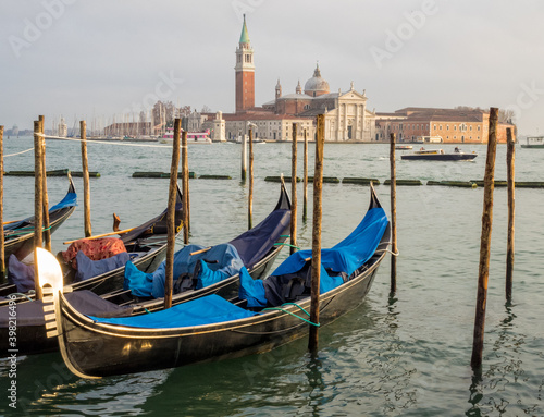 Parking gondolas at the Traghetto Gondole Molo, St Mark's Square - Venice, Veneto, Italy © lkonya