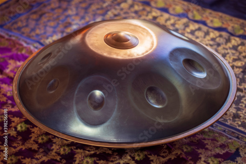 Close-up of hang drum. Hang, handpan, drum musical instrument. photo