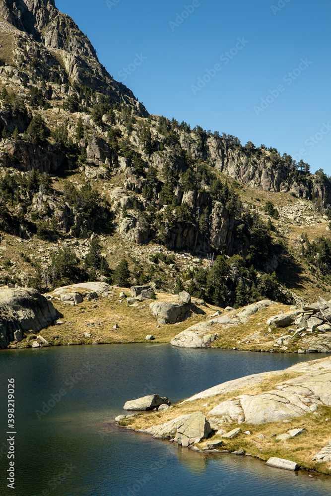 Mountainous landscape with lakes and blue sky