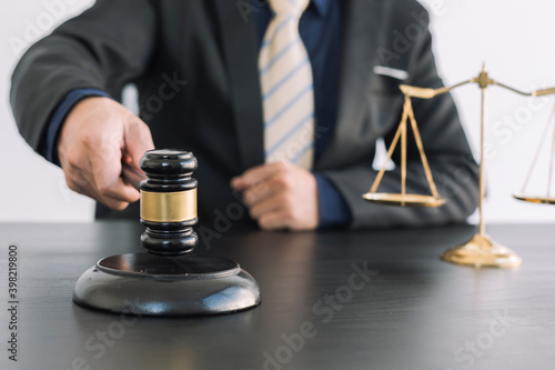 Attorneys or judges use the president's gavel to judge justice matters at law firms, legal concepts and legal services.