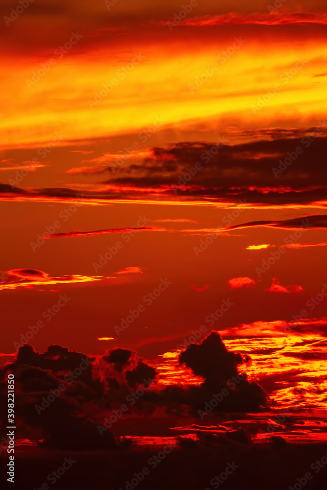 Fototapeta The sky is on fire at sunset. The sea and a beautiful red clouds.