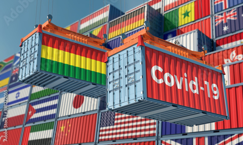 Container with Coronavirus Covid-19 text on the side and container with Bolivia Flag. 3D Rendering © Marius Faust