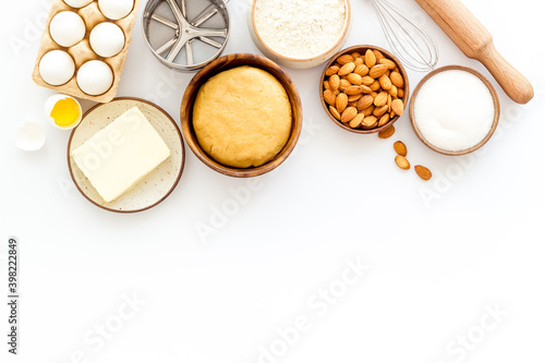 Baking homemade cake or cookie - dough in bowl with ingredients, top view