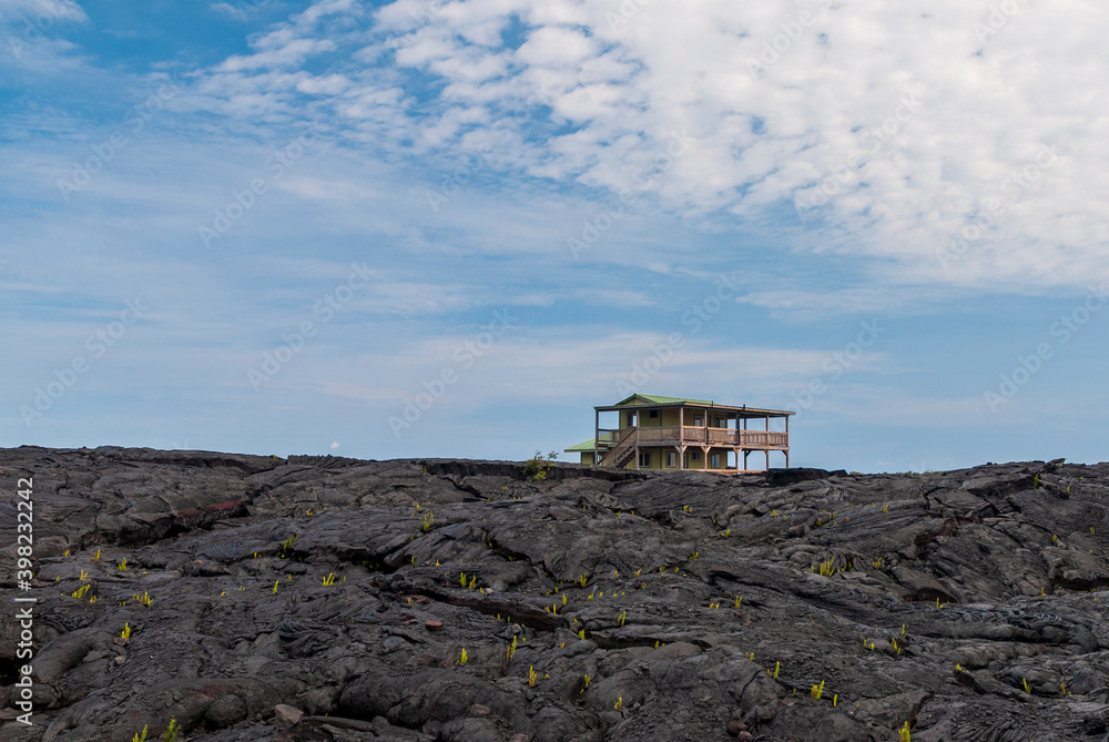 Obraz premium wooden house on the lava