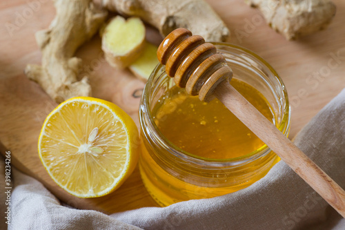 Organic Cold Cures. Honey, lemon, ginger. Folk remedies for the treatment of colds.