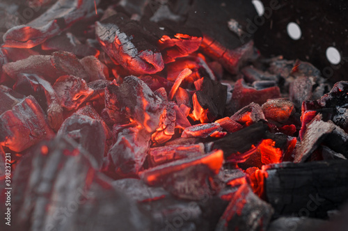 Red hot coals in the grill