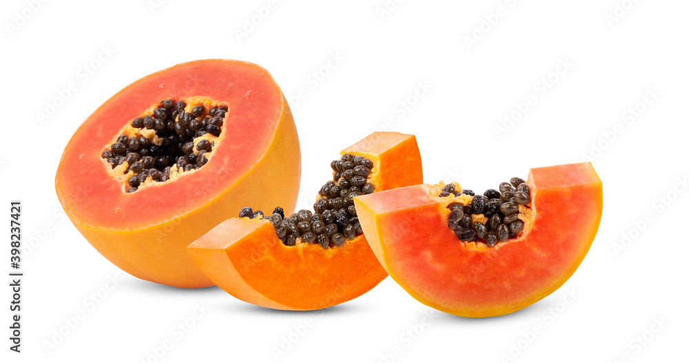 half ripe papaya fruit with seeds on white background half ripe papaya fruit with seeds on white background