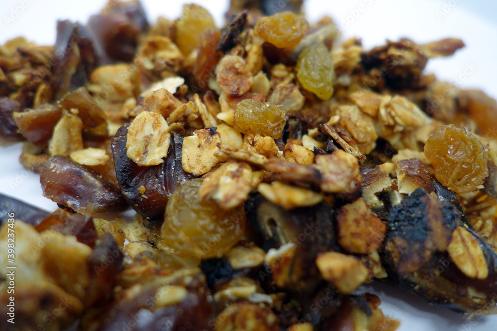 Tasty granola on white with blur effect. Tasty granola on white with blur effect.