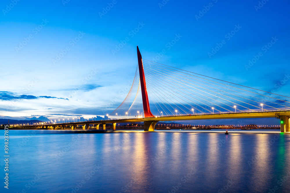 Modern bridge in the city at night