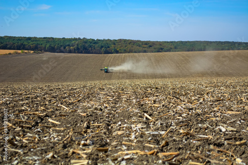 sowing grain with a modern machine in the field photo