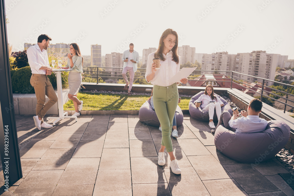 Nice stylish entrepreneurs leaders spending time gathering company culture communication on roof outside outdoor sunny day - obrazy, fototapety, plakaty 