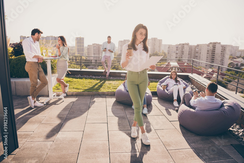 Nice stylish entrepreneurs leaders spending time gathering company culture communication on roof outside outdoor sunny day