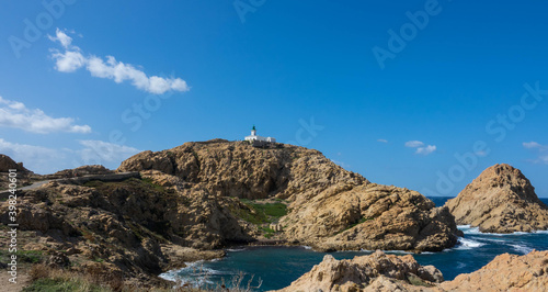 Lighthouse Phare de la Pietra, also referred L'Île-Rousse lighthouse is located on the coastal town L'Île-Rousse, northwest of Corsica. France