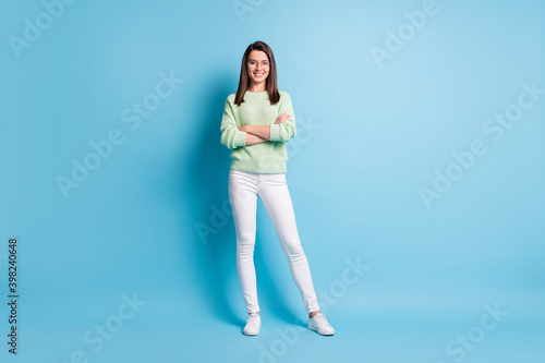 Full size photo of nice pretty lady cross hands isolated over blue pastel color background