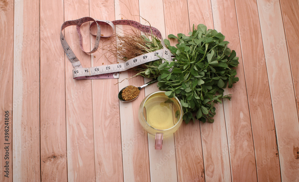 Close up of Fenugreek with its seeds and powder and the extracted water. It helps in numerous digestive problems etc. Close up of Fenugreek with its seeds and powder and the extracted water. It helps in numerous digestive problems etc.