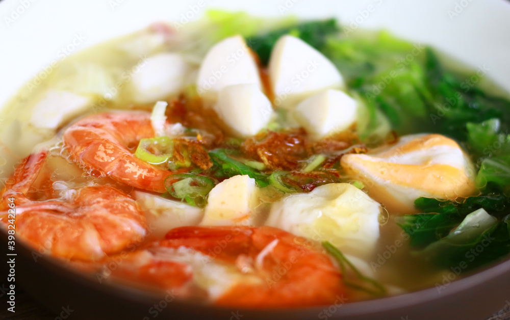 Tom yam soup on wood background. Tom yam soup on wood background.