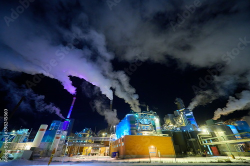 Factory at Night Air Pollution From Industrial Smoke