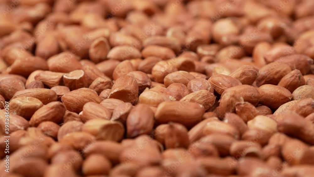Peeled peanuts, side view. Protein food. Peeled peanuts, side view. Protein food.