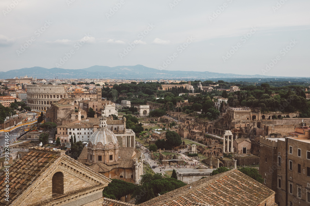 Panoramic view of city Rome with Roman forum and Colosseum from Vittoriano