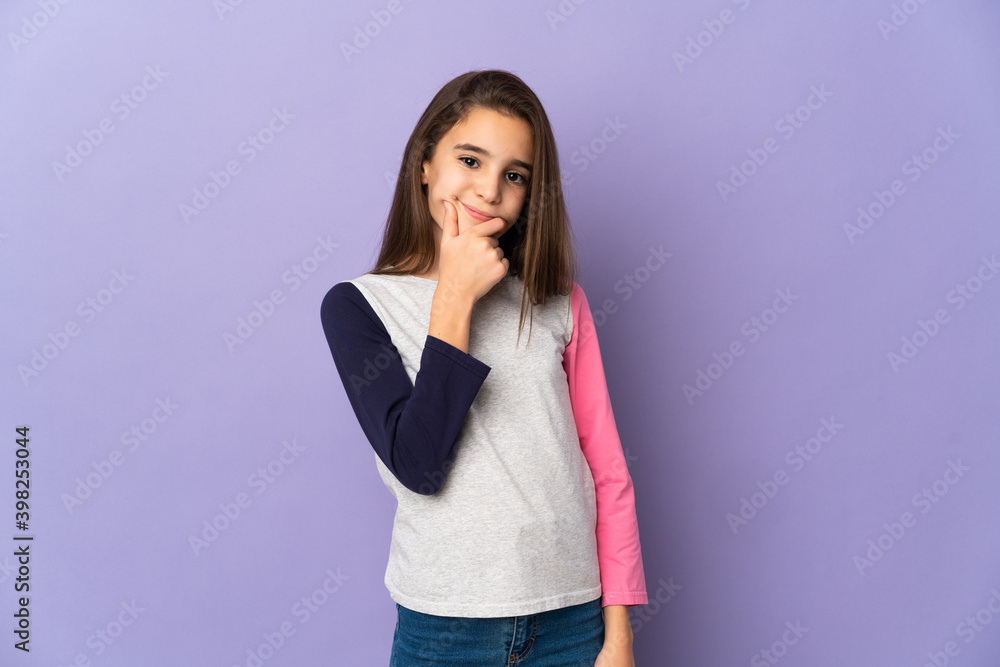 Little girl isolated on purple background having doubts Little girl isolated on purple background having doubts