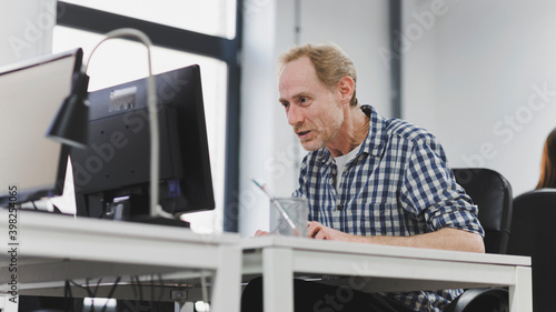 Man using computer in office